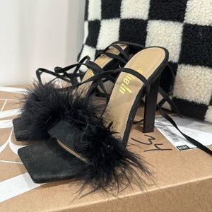 FUZZY HEELS